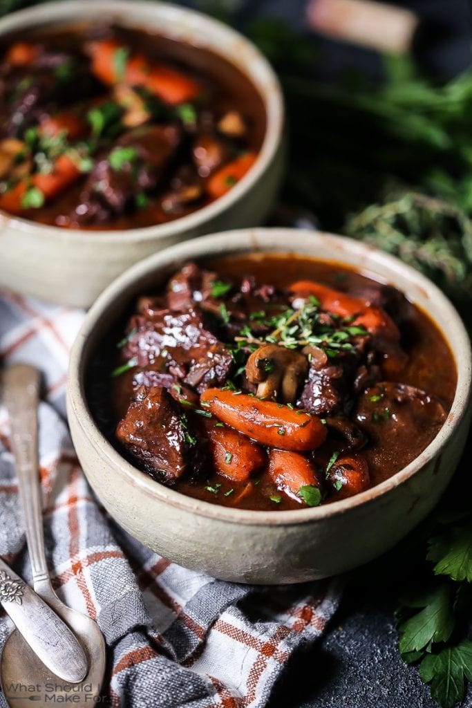Beef Bourguignon - Cubes of Seared Beef, Caramelized Onions, Baby Carrots, Wild Mushroom and Potatoes in a Delicious Red Wine and Herb Sauce Flecked with Pancetta (serves 6-8)