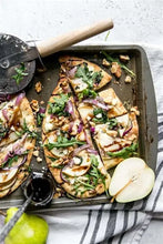Load image into Gallery viewer, Flatbreads · Caramelized Pears, Manchego, Herbs, Walnuts, Arugula &amp; Pomegranate or Lump Crab with Corn from the Summer (2 per order)
